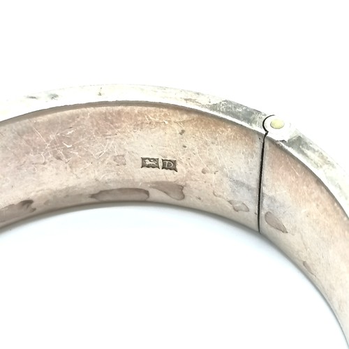 761 - Silver hallmarked bangle marked 9ct gold front with engraved detail - 6.5cm across & 30g total weigh... 