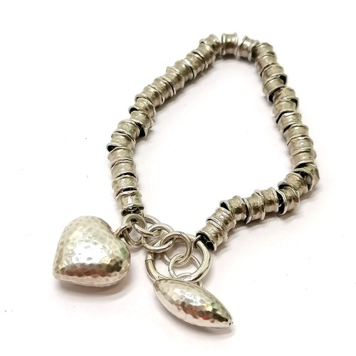 790 - 925 silver marked fancy link bracelet (18cm & 22g) with heart fob in a Links box