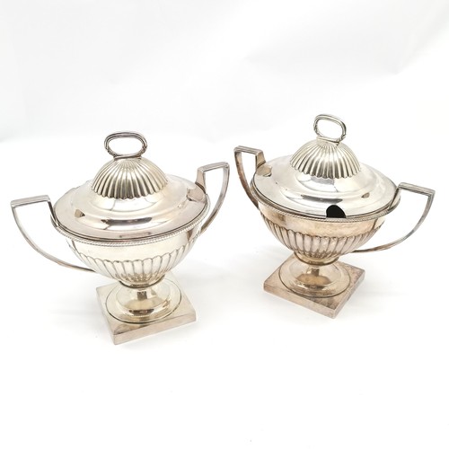 910 - Pair of silver plated trophy shaped 2 handled tureens with covers terminating on square bases 17cm h... 