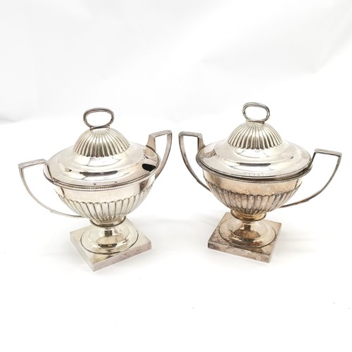 910 - Pair of silver plated trophy shaped 2 handled tureens with covers terminating on square bases 17cm h... 