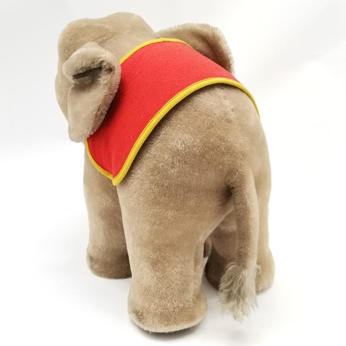 116 - 1950's Steiff grey elephant with a red and yellow felt saddle with original paper label  34cm high x... 