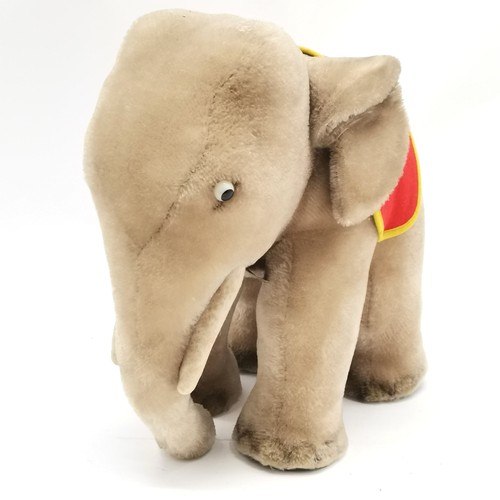 116 - 1950's Steiff grey elephant with a red and yellow felt saddle with original paper label  34cm high x... 