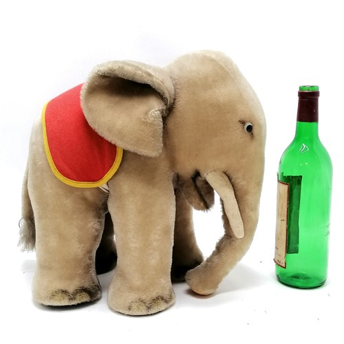 116 - 1950's Steiff grey elephant with a red and yellow felt saddle with original paper label  34cm high x... 