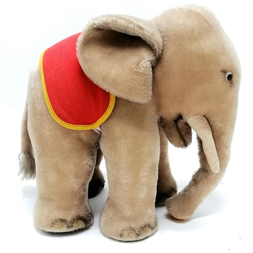 116 - 1950's Steiff grey elephant with a red and yellow felt saddle with original paper label  34cm high x... 