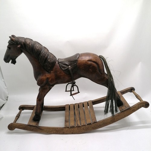 119 - Folk art carved wooden rocking horse with leather saddle and glass eyes - 82cm long x 57cm high ~ 1 ... 