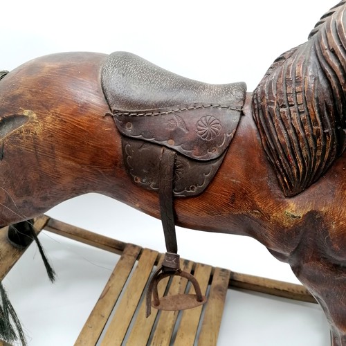 119 - Folk art carved wooden rocking horse with leather saddle and glass eyes - 82cm long x 57cm high ~ 1 ... 