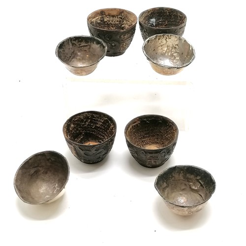 127 - 4 x antique Chinese hand carved wooden cups with silver marked liners with gold filled character det... 