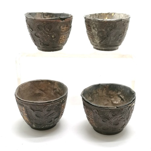 127 - 4 x antique Chinese hand carved wooden cups with silver marked liners with gold filled character det... 