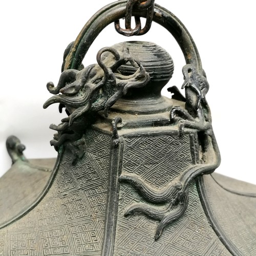 149 - Antique Chinese bronze hanging lantern in the form of a pagoda with dragon detail to top and has ope... 