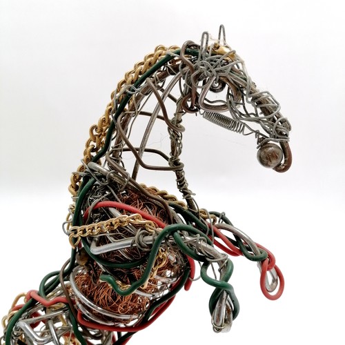 225 - 2014 mixed media sculpture of a rearing horse on a wooden base marked RJD-H ~ 29cm high