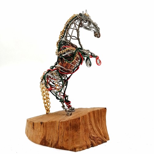 225 - 2014 mixed media sculpture of a rearing horse on a wooden base marked RJD-H ~ 29cm high