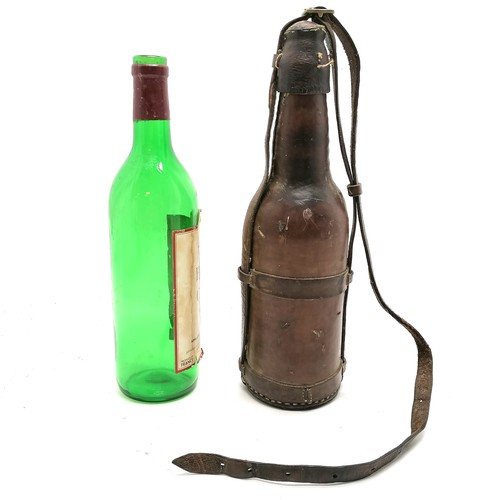 226 - Antique military campaign leather covered bottle with carry handle - 33cm high & missing 1 strap to ... 