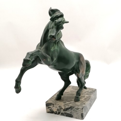 229 - Art Deco green patinated prancing horse figure on marble base - 35cm high x 37cm across ~ chips to c... 