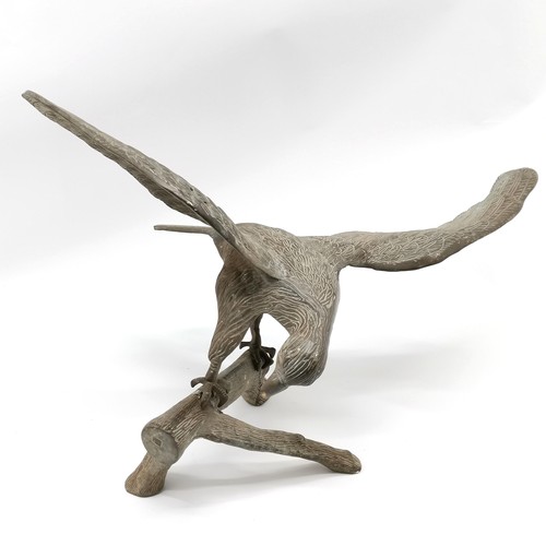 242 - Brass figure of an eagle on a branch - 39cm high x 62cm wingspan