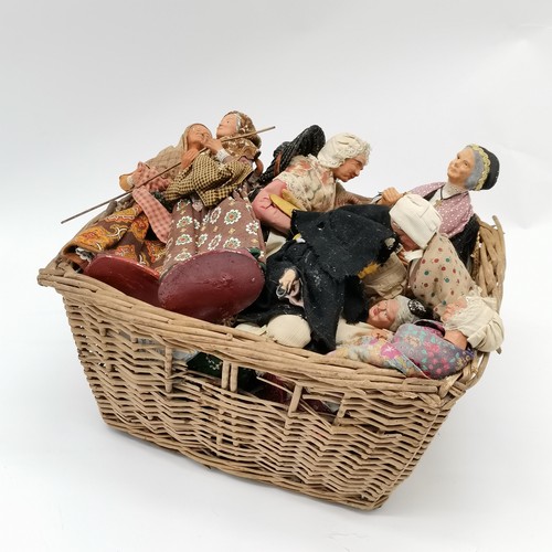 257 - Qty of Continental terracotta pedlar dolls etc in a basket ~ 3 a/f