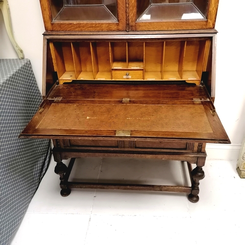 261 - Oak bureau bookcase with leaded glass doors with original key- has 1 handle missing - 90cm long x 44... 