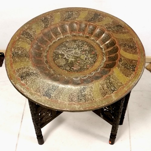 318 - Indian Benares folding table with brass circular top and pierced decorated base - 59cm deep x 53cm h... 