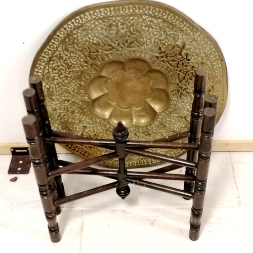 319 - Indian Bernares folding table with brass circular top - 62cm diameter x 52cm high