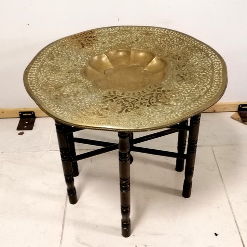 319 - Indian Bernares folding table with brass circular top - 62cm diameter x 52cm high