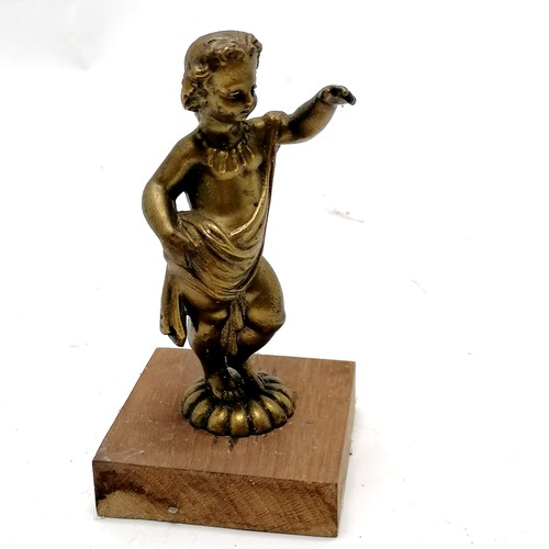 335 - Antique cast bronze study of a classical figure of a child mounted on a wooden base - 14.5cm high