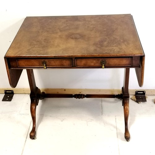 371 - Antique reproduction walnut sofa table with stretcher base and pad feet with brass castors, has reta... 