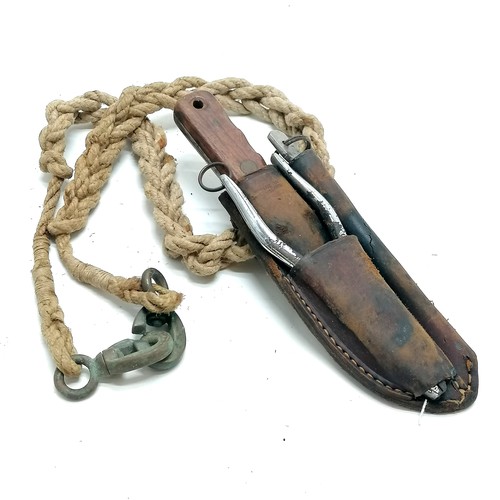 385 - J Nowill sailors knife in original leather sheaf with original fid & pliers on a hand worked rope la... 