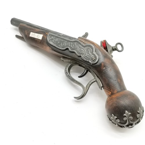 393 - Reproduction model of an antique flintlock pistol with wooden stock and metal mounts - 29cm long