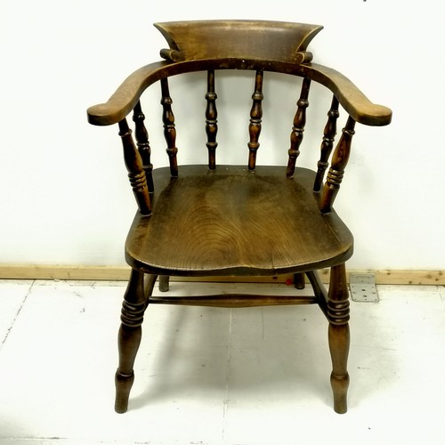 428 - Antique elm captains chair 80cm high - has a small split to the seat