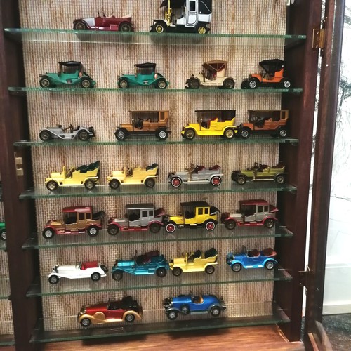 461 - Double wooden display cabinet containing 47 models of cars - 65cm x 93cm x 10cm