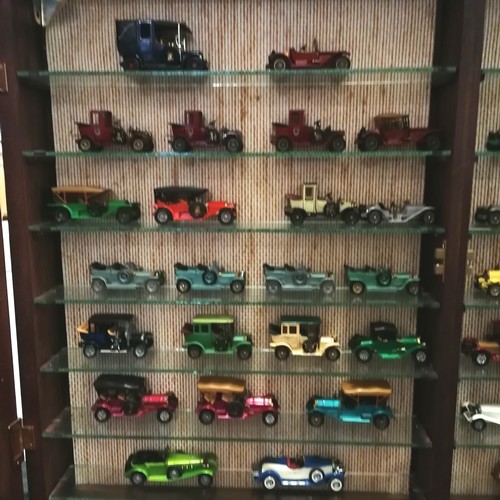 461 - Double wooden display cabinet containing 47 models of cars - 65cm x 93cm x 10cm