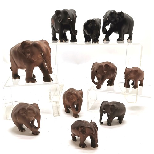 465 - 10 x hand carved wooden elephants - tallest 10cm & has old screw repair ~ all slight a/f