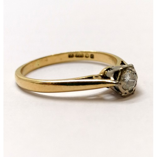 555 - 18ct hallmarked gold diamond solitaire ring with a hexagonal shaped mount - size M½ & 2.2g total wei... 