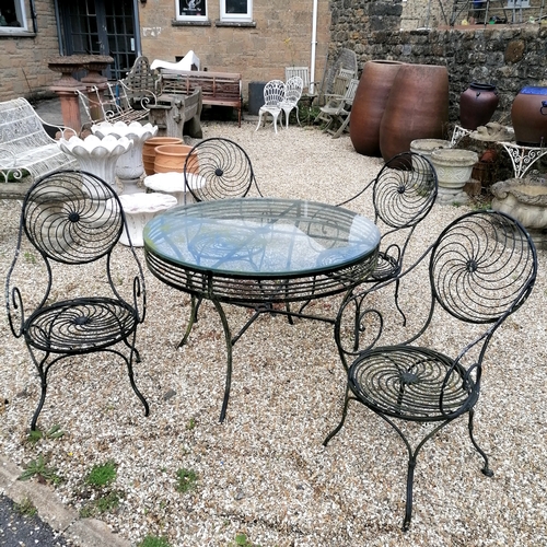 20A - Glass topped circular black wrought iron table with 4 matching unusual wirework designed chairs  - t... 