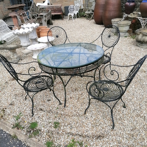 20A - Glass topped circular black wrought iron table with 4 matching unusual wirework designed chairs  - t... 