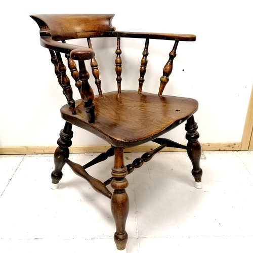 472 - Antique elm captains chair 77cm high - has an old repair to the back and has old crack to seat