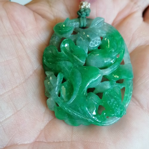 620 - Chinese hand carved green jade pendant with pierced flower / fruit detail with a pink jade bead - pe... 