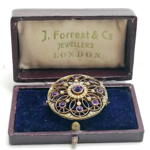 403 - Antique 15ct marked gold circular brooch set with amethyst / pearl by Murrle Bennett & Co - 3.2cm di... 