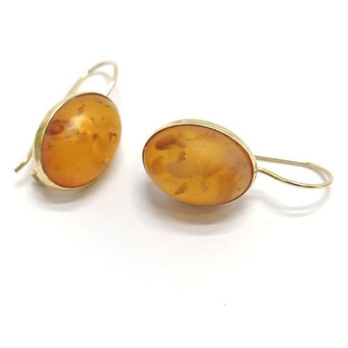 409 - 9ct hallmarked gold amber set earrings - 2.5cm drop & 3.2g total weight