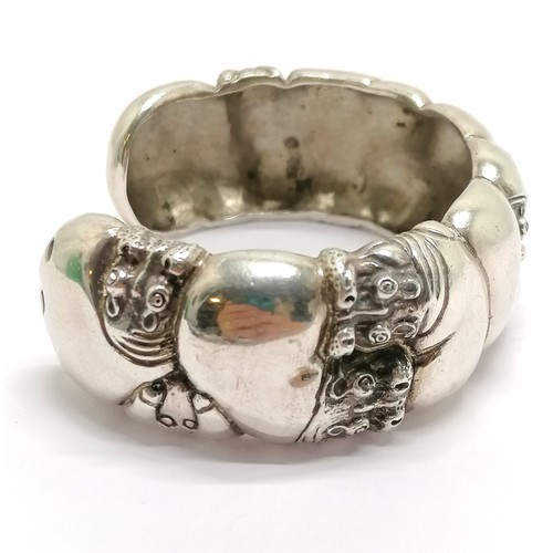 427 - Patrick Mavros (Zimbabwe) silver hippo cuff bangle - 68mm across & 68g RRP £550 - has signs of use b... 