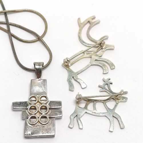 429 - Scandinavian 2 x silver reindeer brooches marked JAN 925 t/w 925 silver marked designer pendant on s... 