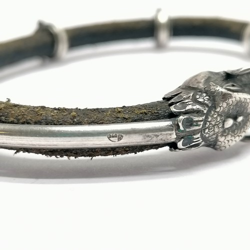 432 - Viking silver & leather bangle with dragon head detail - 9cm across & 29g total weight