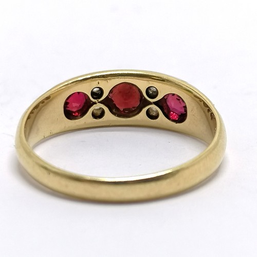 440 - Antique 18ct hallmarked gold ruby / diamond set ring - size R & 4.6g total weight ~ centre stone has... 