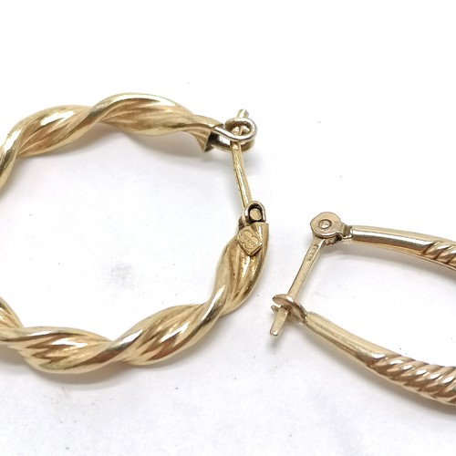 459 - 2 x pairs of 9ct marked gold hoop earrings - largest 2.2cm & 3.2g total weight - SOLD ON BEHALF OF T... 