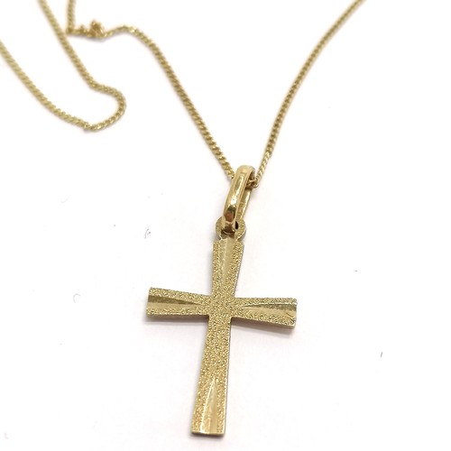 479 - 9ct marked gold cross pendant on fine 9ct gold 40cm chain - 0.9g - SOLD ON BEHALF OF THE NEW BREAST ... 