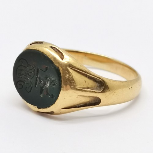 497 - Antique unmarked gold (touch tests as 18ct) bloodstone intaglio seal ring - size Q½ & 5.5g total wei... 