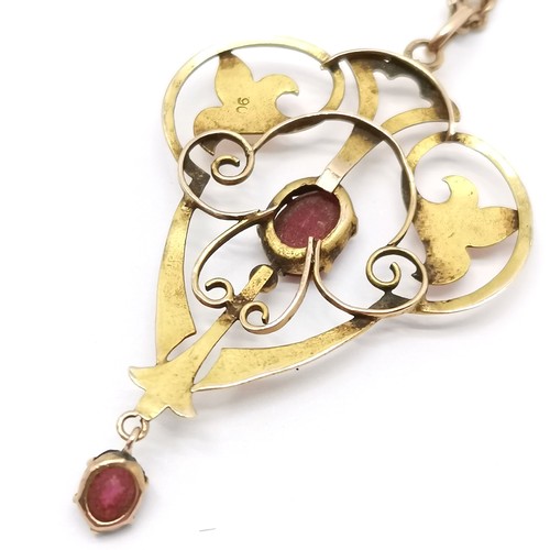 507 - Antique 9ct marked gold Art Nouveau pendant set with red stone (4cm drop) on a 9ct marked gold 44cm ... 