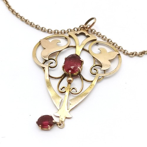 507 - Antique 9ct marked gold Art Nouveau pendant set with red stone (4cm drop) on a 9ct marked gold 44cm ... 