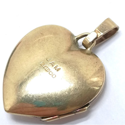 537 - 9ct hallmarked gold heart shaped locket pendant set with a diamond by J A Main Ltd - 2.5cm drop & 1.... 