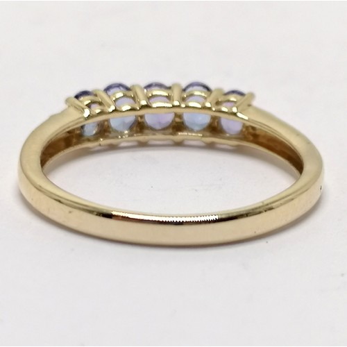 553 - 14ct hallmarked gold tanzanite (5) / diamond (2) stone set ring - size Q & 2.3g total weight