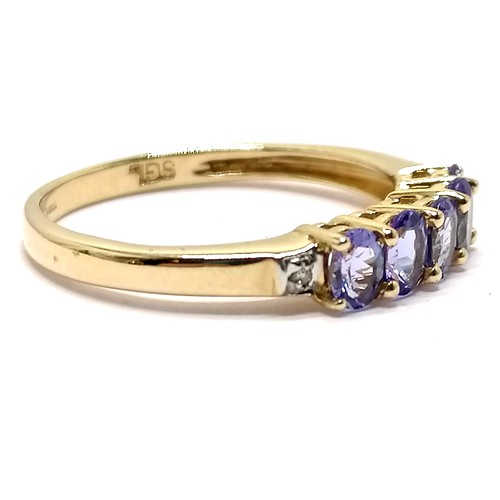 553 - 14ct hallmarked gold tanzanite (5) / diamond (2) stone set ring - size Q & 2.3g total weight